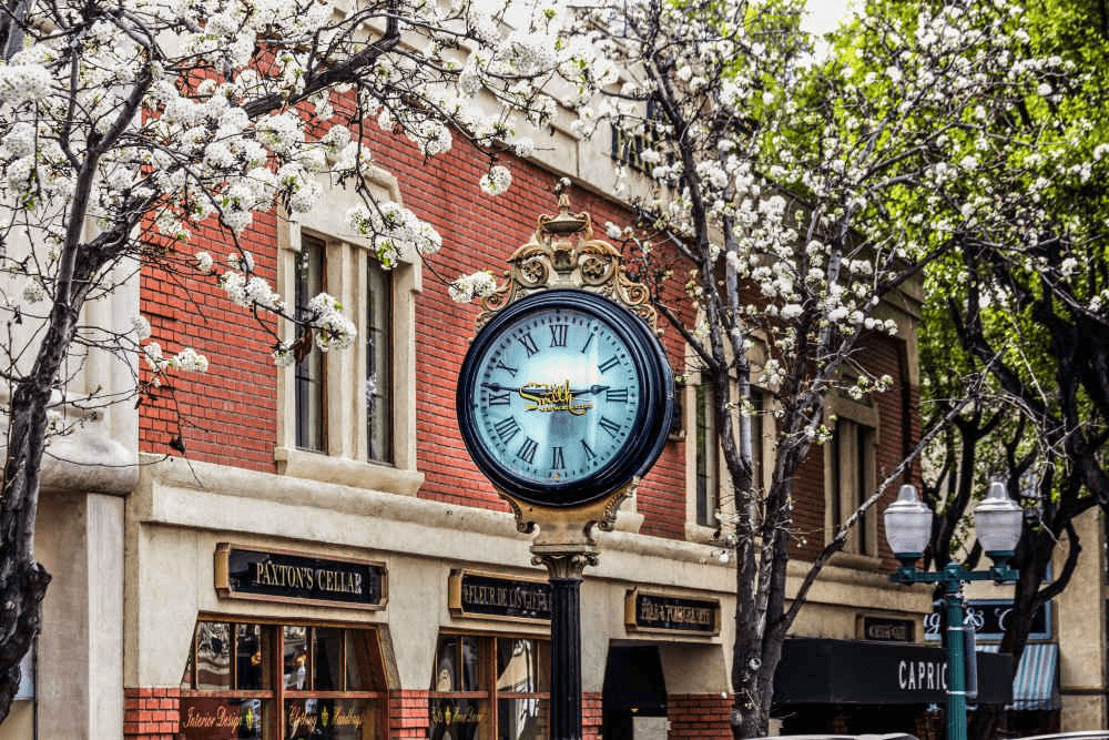 Historic street clock and brick storefronts in downtown Redlands CA — June 2026 real estate market report